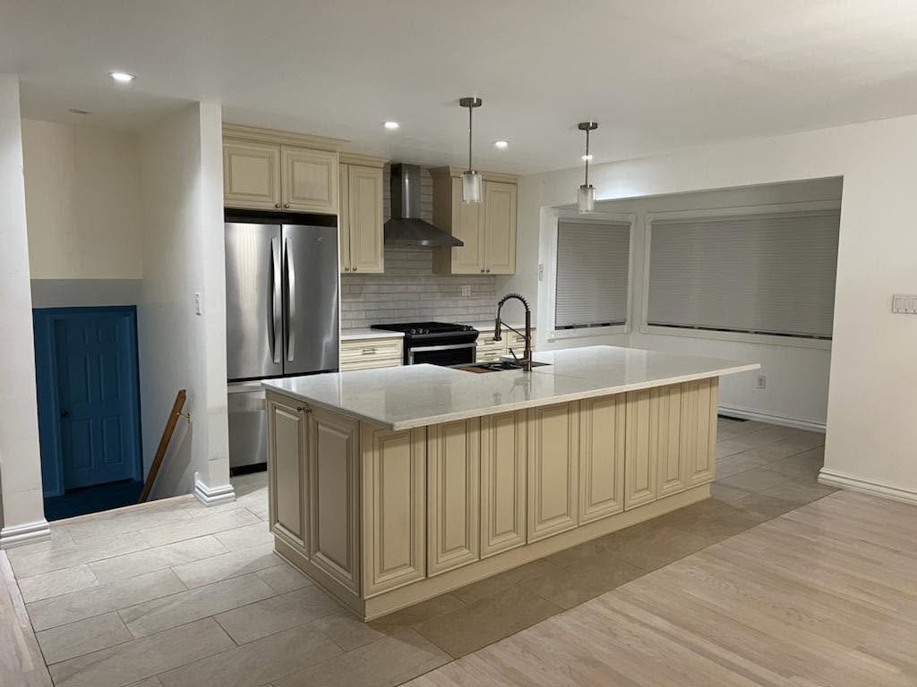 Finished kitchen with freshly painted white walls